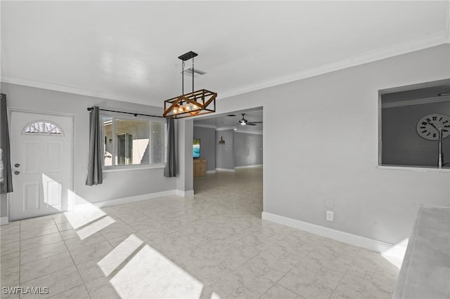 unfurnished dining area with crown molding and ceiling fan