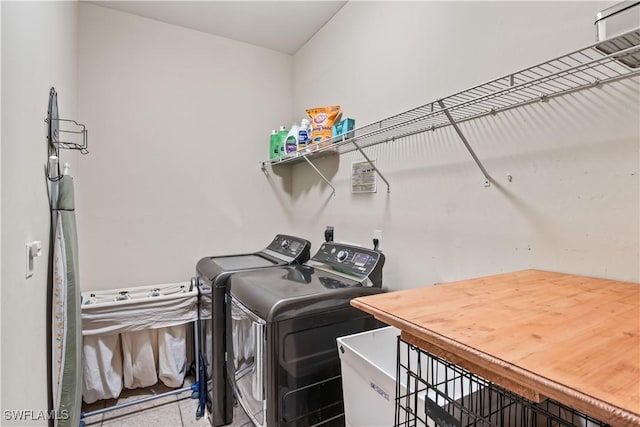 laundry room featuring washer and clothes dryer