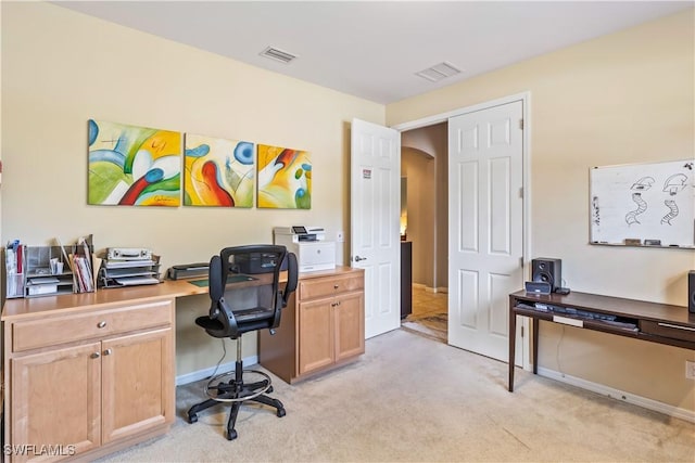 office area with light colored carpet