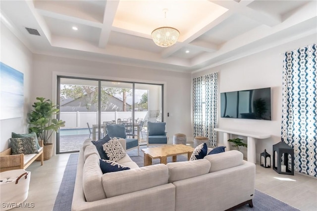 living room featuring an inviting chandelier, coffered ceiling, beam ceiling, and light hardwood / wood-style flooring