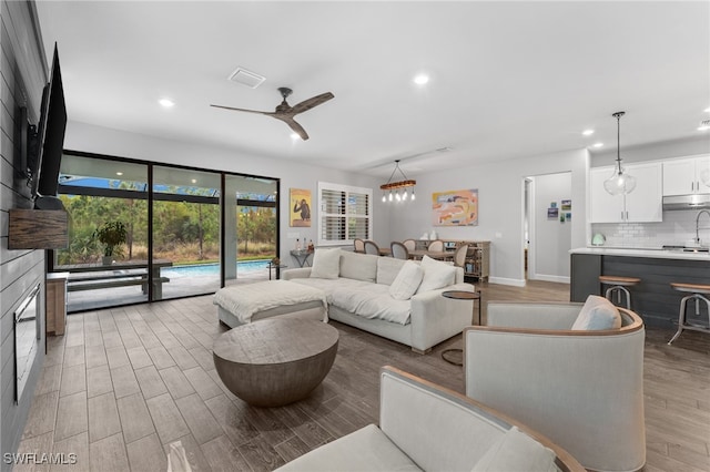 living room featuring ceiling fan