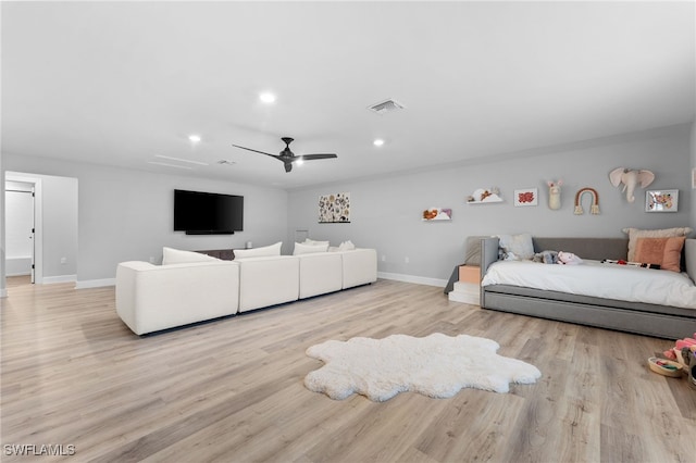 bedroom featuring ceiling fan and light hardwood / wood-style floors