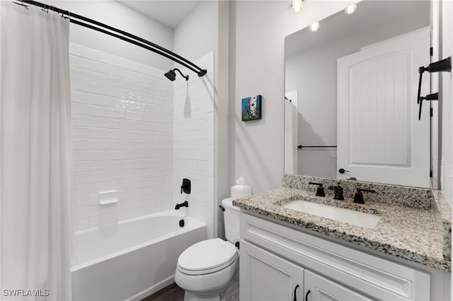 full bathroom featuring toilet, vanity, and shower / bathtub combination with curtain