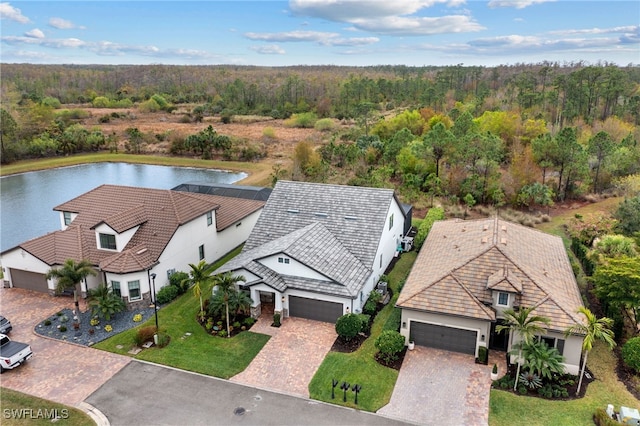 birds eye view of property featuring a water view