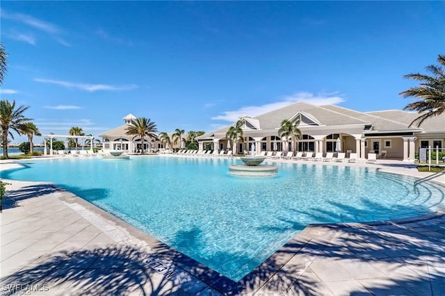 view of swimming pool with a patio