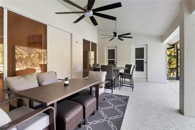 exterior space with ceiling fan