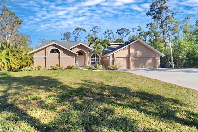 ranch-style house with a garage and a front lawn