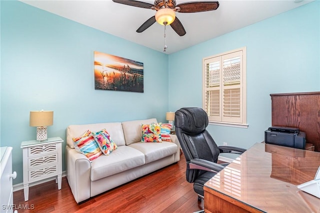 office space with ceiling fan and dark hardwood / wood-style flooring