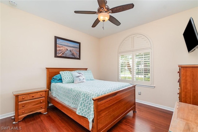 bedroom featuring dark hardwood / wood-style floors and ceiling fan