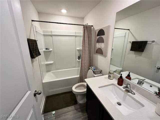 full bathroom with shower / bath combo, vanity, and toilet