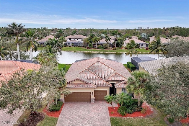 bird's eye view with a water view