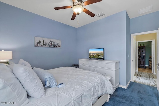 bedroom with light carpet and ceiling fan