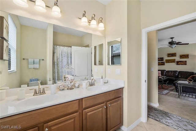 bathroom featuring a shower with curtain, ceiling fan, tile patterned floors, and vanity