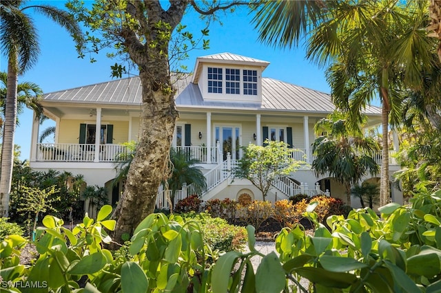 coastal home featuring french doors