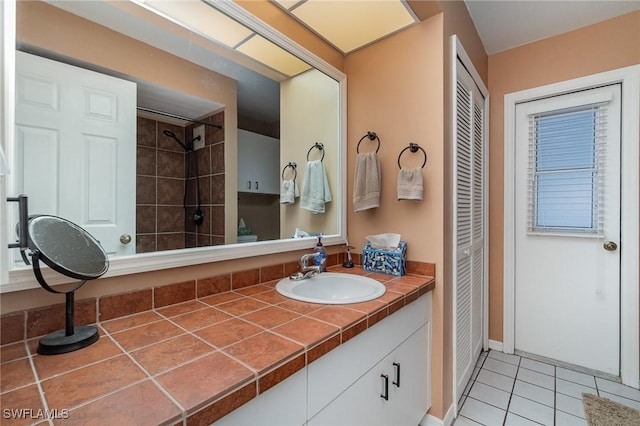 bathroom with vanity and tile patterned floors