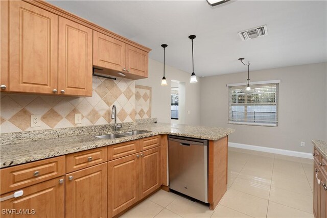 kitchen with a peninsula, a sink, visible vents, decorative backsplash, and dishwasher