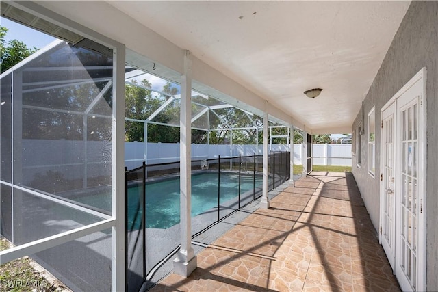 view of pool featuring a lanai, a fenced backyard, a fenced in pool, and a patio