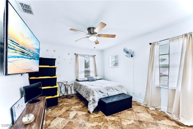 bedroom featuring ceiling fan