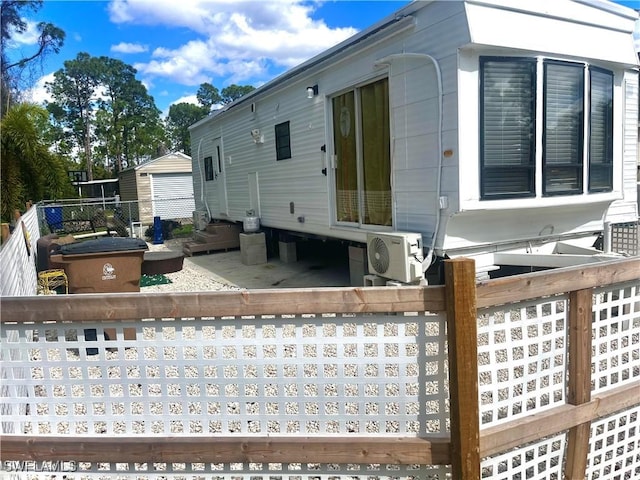 exterior space featuring ac unit