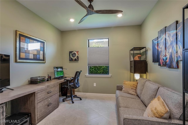 office space with ceiling fan and light tile patterned floors