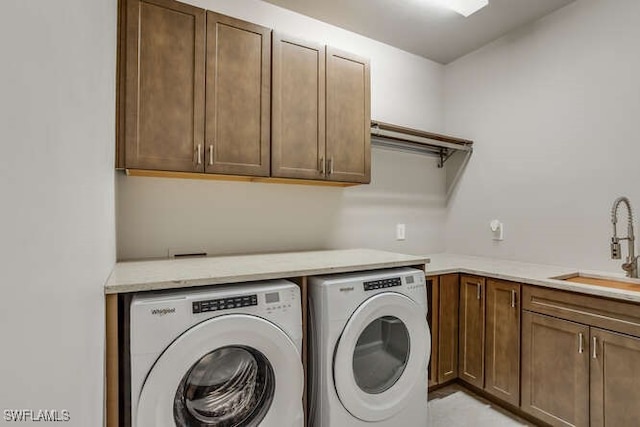 16569 Windsor Way, Alva, FL 33920 - washroom featuring washing machine and dryer and cabinet space