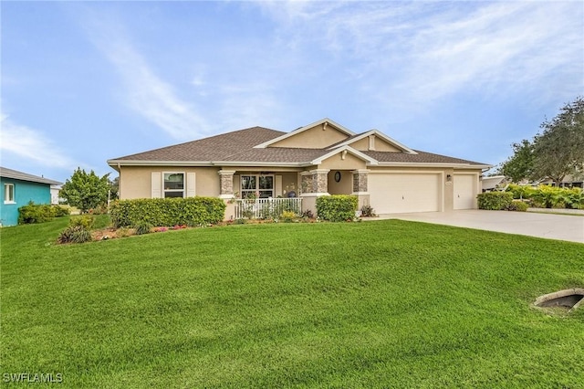 view of front of property featuring a garage and a front yard