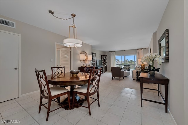 view of tiled dining space