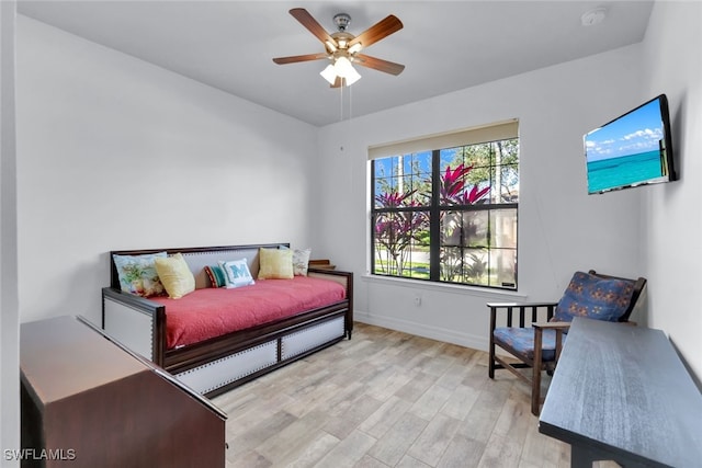 bedroom featuring light hardwood / wood-style floors and ceiling fan