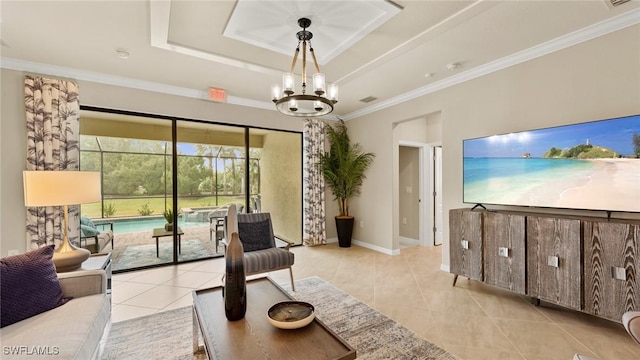 tiled living room with an inviting chandelier, crown molding, and a raised ceiling