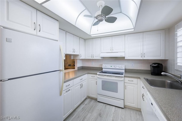 kitchen featuring white cabinetry, sink, white appliances, and ceiling fan