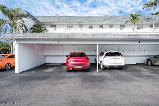 view of car parking featuring a carport