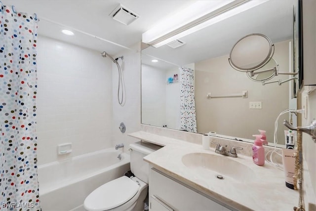 full bathroom featuring vanity, toilet, and shower / tub combo with curtain