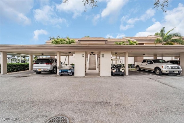 view of parking with a carport