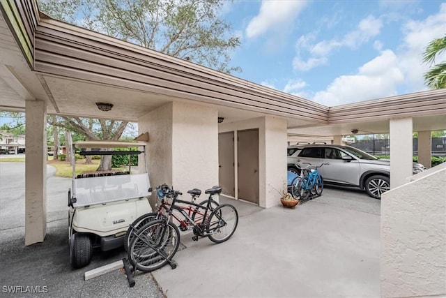 garage featuring a carport