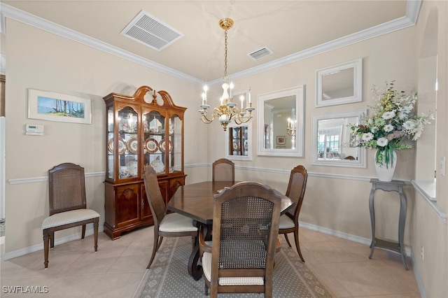 tiled dining area with crown molding and a chandelier