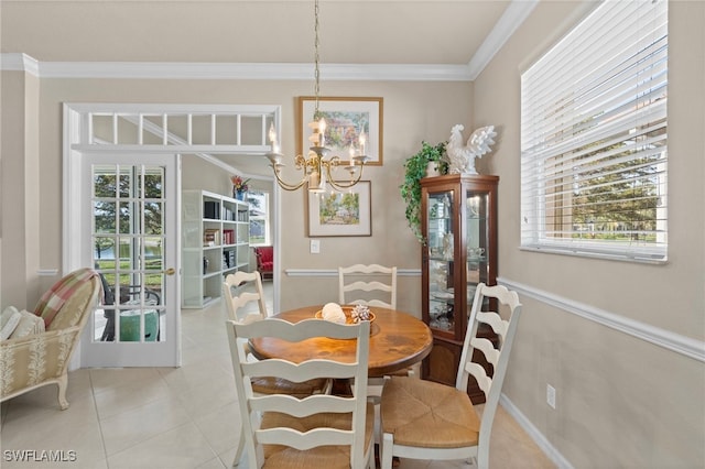 dining space featuring light tile patterned floors, crown molding, and a notable chandelier