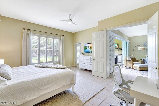 tiled bedroom with ceiling fan