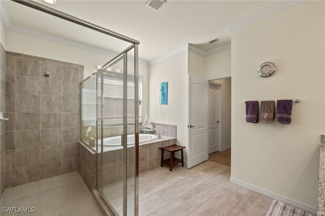 bathroom featuring ornamental molding and shower with separate bathtub