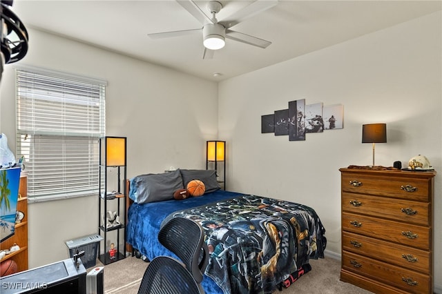 carpeted bedroom featuring ceiling fan