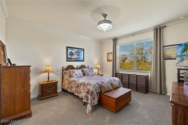 carpeted bedroom featuring crown molding