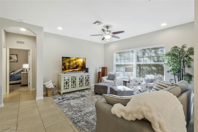 23601 Alamanda Dr Unit 202, Estero, FL 34135 - living area featuring ceiling fan, arched walkways, light tile patterned floors, recessed lighting, and baseboards
