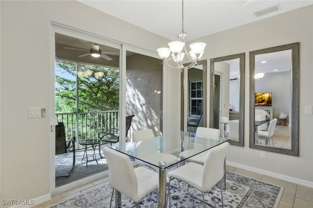 23601 Alamanda Dr Unit 202, Estero, FL 34135 - dining space with a chandelier, light tile patterned flooring, baseboards, and ceiling fan