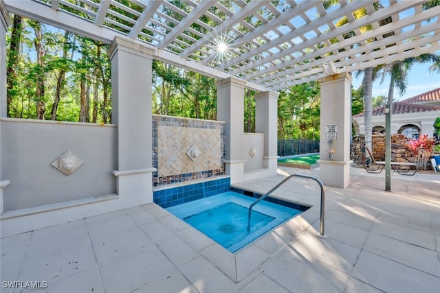 view of swimming pool featuring a pergola, a patio, and an in ground hot tub