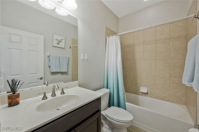 full bathroom featuring vanity, shower / tub combo with curtain, and toilet