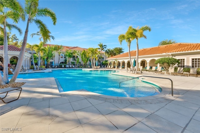 pool with a patio