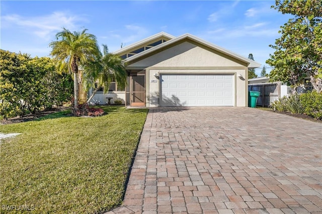 view of front facade featuring a garage and a front yard