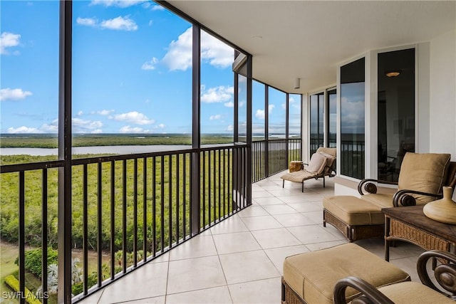 sunroom with a water view