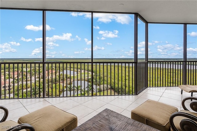 sunroom with a water view