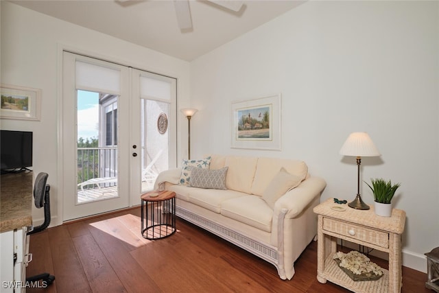 living room featuring french doors, ceiling fan, and dark hardwood / wood-style floors