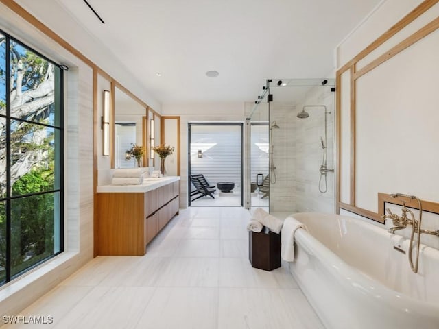 bathroom featuring independent shower and bath and vanity